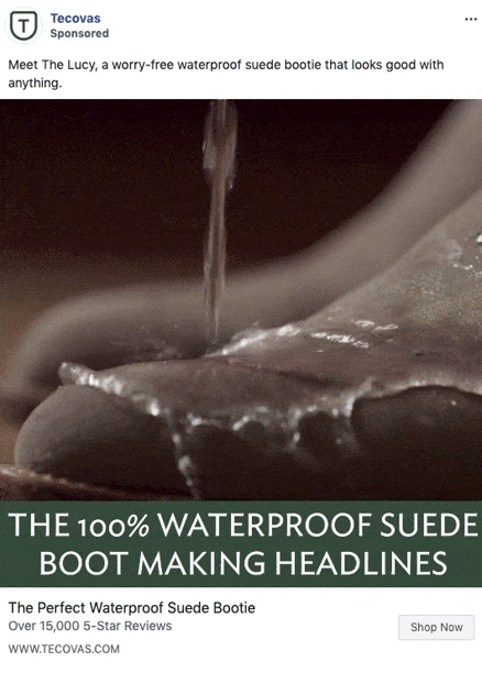 Close-up of water being poured onto a brown suede boot, demonstrating its waterproof feature. Text reads: "The 100% waterproof suede boot making headlines.