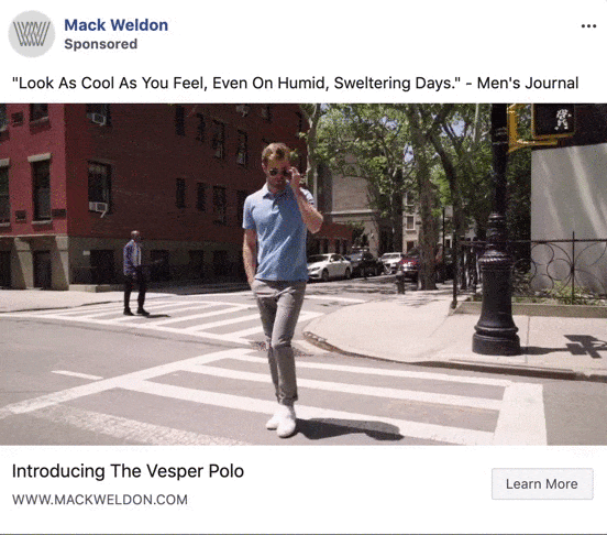 A man walking across a street.