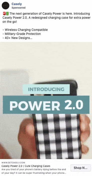 A hand holds a black and white checkered phone case with the text "INTRODUCING POWER 2.0" overlaid on the image.