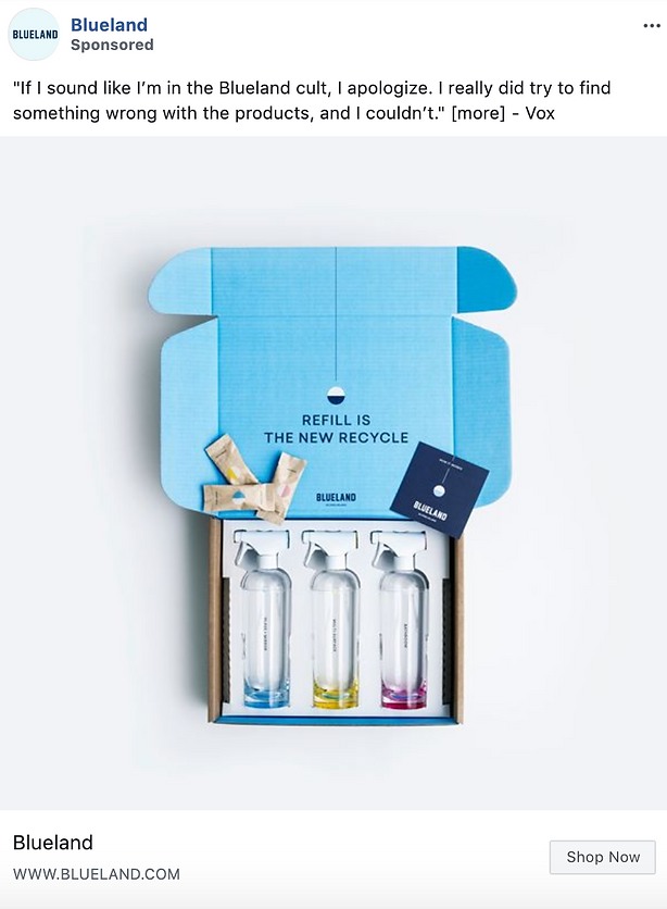 Open Blueland box with three empty spray bottles, three colored refill tablets, product booklet, and message inside lid: "REFILL IS THE NEW RECYCLE.