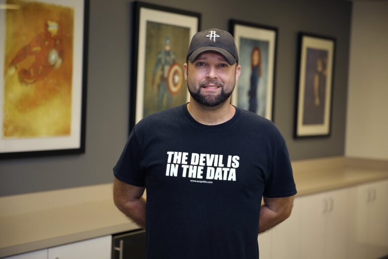 A man in a black shirt.