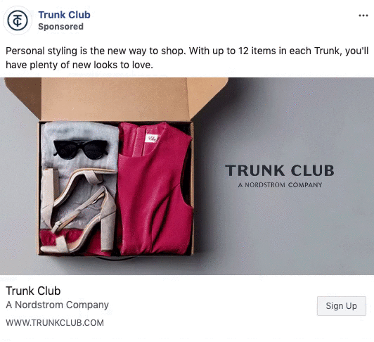 Open box with folded red dress, beige high heels, black sunglasses, and a gray sweater, displayed next to "TRUNK CLUB A NORDSTROM COMPANY" text on a gray background.