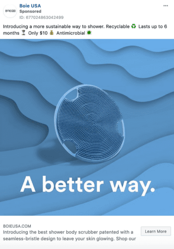 Round blue shower scrubber with fine bristles displayed on a wavy blue background, promoting its sustainability, recyclability, and antimicrobial features. Text reads: "A better way.