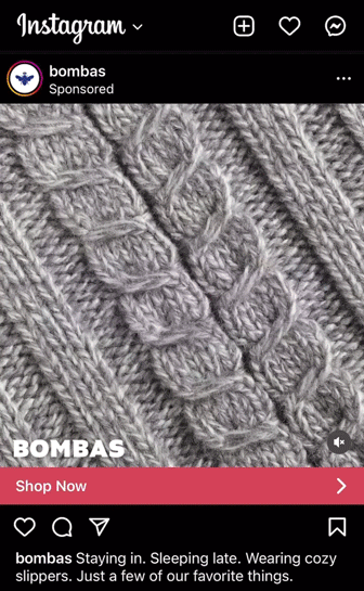 Close-up of a gray knitted fabric with a cable pattern, featured in a Bombas Instagram ad.