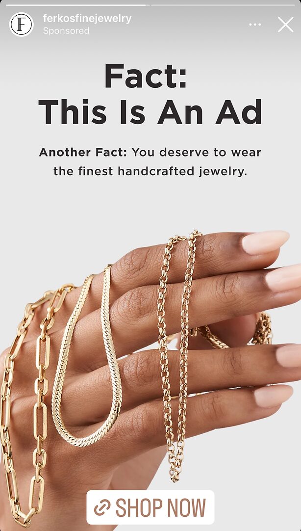 A hand with manicured nails holds three different gold chain necklaces against a neutral background, with text promoting handcrafted jewelry.