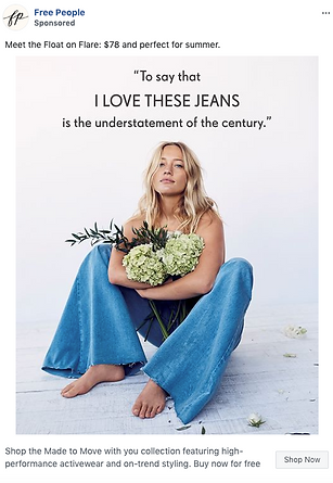 A woman in wide-leg jeans sits barefoot on the floor holding a bouquet of green flowers. Text above reads: "To say that I love these jeans is the understatement of the century.