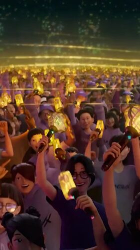 Animated crowd holding glowing yellow light sticks at a concert or event, with many people smiling and raising their hands, set against a background of lights.