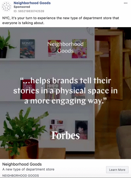 A quote from Forbes about Neighborhood Goods is displayed on a blurred background of a modern store interior with books and plants.