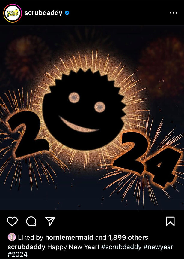 Scrub Daddy sponge logo with "2024" in bold numbers, set against a background of golden fireworks.