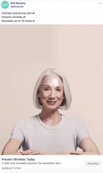 A smiling older woman with straight gray hair wears a light-colored shirt, promoting SiO Beauty wrinkle prevention products against a plain background.