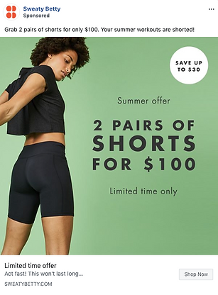 A woman wearing black shorts and a cropped top stands in front of a green background next to text advertising "2 pairs of shorts for $100" as a limited-time summer offer.