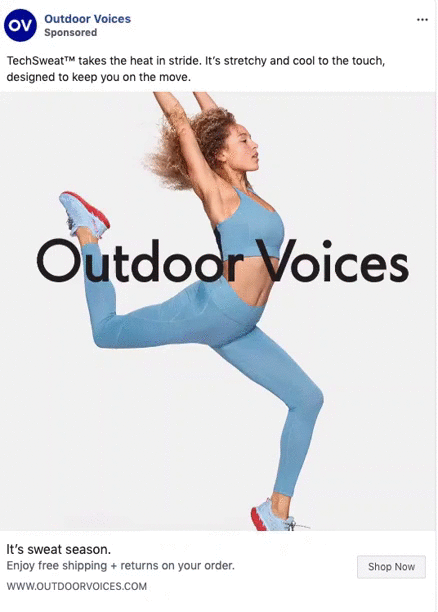 A woman in light blue athletic wear jumps energetically against a plain background. Text reads "Outdoor Voices." This is an ad for outdoor performance clothing.