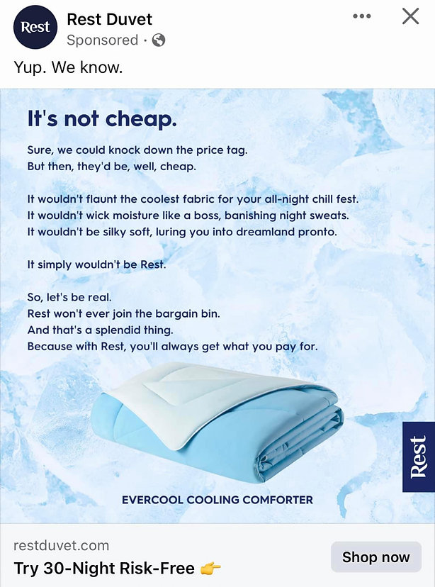 A blue and white comforter is displayed on a bed with ice-like graphics in the background, alongside text describing its premium cooling features and higher price.