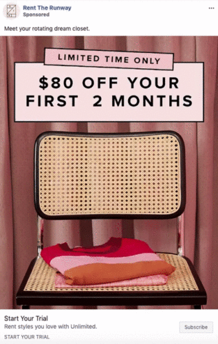 A cane chair in front of pink curtains holds four folded sweaters in red, pink, and orange shades. Text above advertises "$80 off your first 2 months" from Rent the Runway.