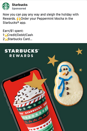 A Starbucks holiday-themed ad featuring a phone displaying a peppermint mocha in a festive cup, next to a snowman cookie on a green background with gold stars.