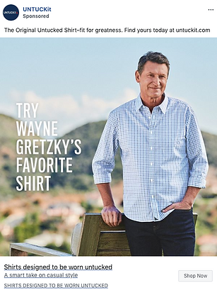 Wayne Gretzky stands outdoors in a blue checked untucked shirt, with mountains in the background and branded promotional text beside him.