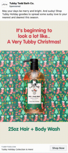 A bottle of Tubby Todd Hair + Body Wash is displayed on a festive holiday background with stockings and Christmas trees. Text above reads, "It's beginning to look a lot like... A Very Tubby Christmas!.