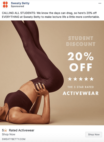 A person wearing burgundy activewear holds a yoga pose beside text advertising a 20% student discount on Sweaty Betty activewear.