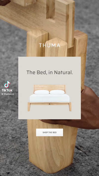 A person assembles a wooden bed frame with no tools; an overlay shows "THUMA The Bed, in Natural" and a button labeled "Shop The Bed.