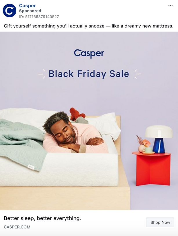 A man rests on a neatly made bed with light bedding in a minimalist room, promoting Casper's Black Friday Sale. A small red nightstand with a lamp and decor sits beside the bed.