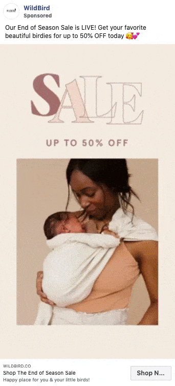 A woman lovingly holds a swaddled baby; text above reads "SALE UP TO 50% OFF.