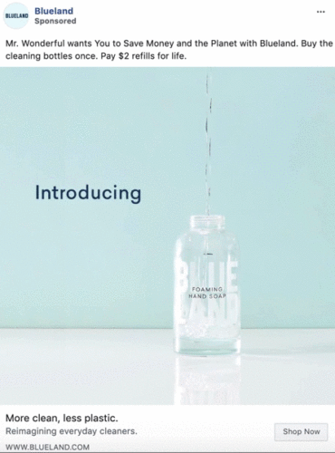 A clear glass bottle labeled "Foaming Hand Soap" is being filled with liquid against a light blue background. Text reads “Introducing.”.