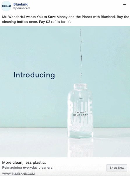 A clear glass bottle labeled "Foaming Hand Soap" is being filled with liquid against a light blue background. Text reads “Introducing.”.