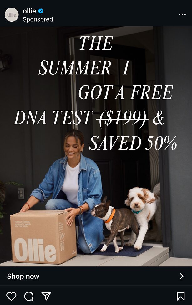 A woman kneels at a doorstep with an Ollie box, smiling at two dogs, one brown and white and one brindle, as they step outside. Text overlays promote a free DNA test and 50% savings.