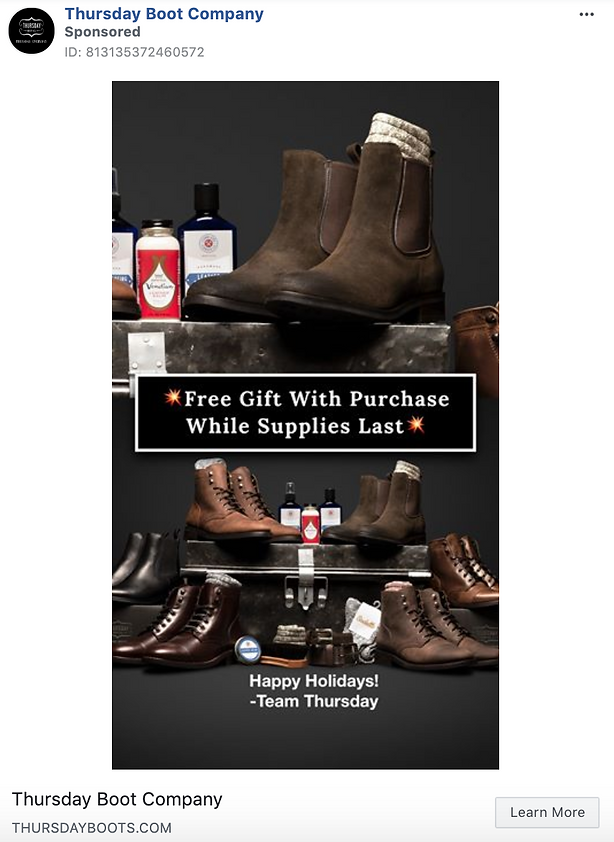 Shelves display various brown and black boots, shoe care products, and accessories. A banner reads, "Free Gift With Purchase While Supplies Last." Text below says, "Happy Holidays! -Team Thursday.