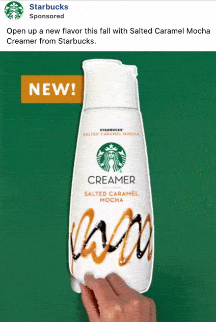 A hand holds a bottle of Starbucks Salted Caramel Mocha Creamer against a green background with "NEW!" text above.