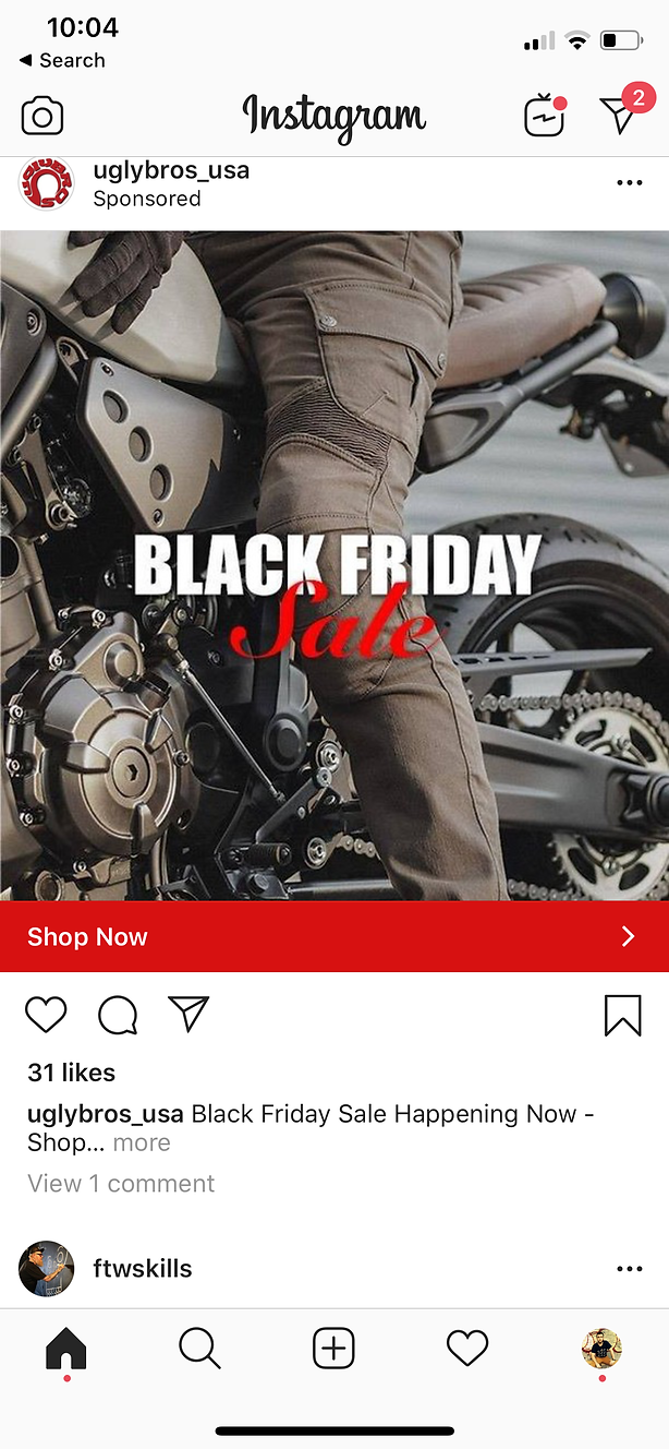 A person in brown motorcycle gear sits on a black motorcycle with "Black Friday Sale" text overlaid.