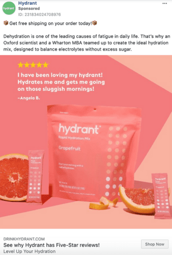 A pink Hydrant Rapid Hydration Mix package and individual drink sticks are displayed with sliced grapefruit, featuring a customer review and hydration benefits.