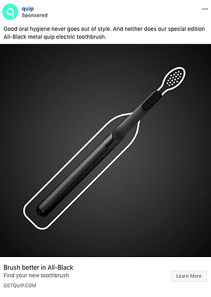 A black electric toothbrush is displayed diagonally on a dark background with a white outline highlighting its shape.