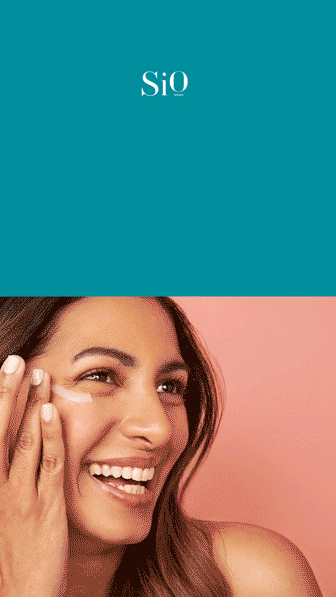 A smiling woman applies cream to her face against a pink background, with the SiO logo displayed above on a teal background.