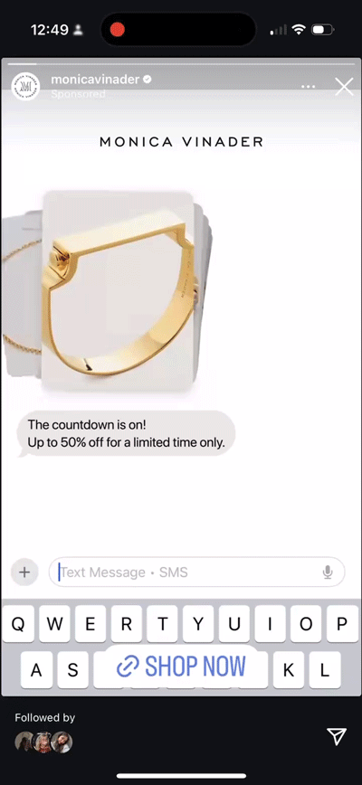 Screenshot of a jewelry promotion for Monica Vinader, showing a gold bracelet and a message offering up to 50% off for a limited time. A "SHOP NOW" button is visible at the bottom.