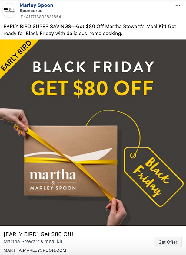 A hand ties a yellow ribbon around a Martha Stewart meal kit box with text promoting $80 off for Black Friday.