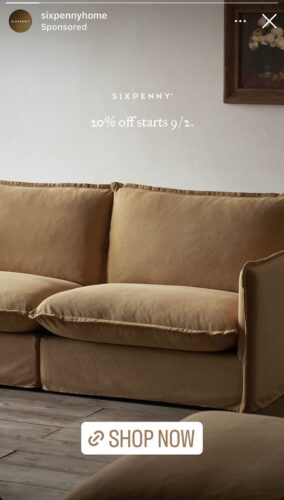 Tan fabric sofa against a neutral wall with a framed painting; text reads "20% off starts 9/2." Shop Now button at the bottom.