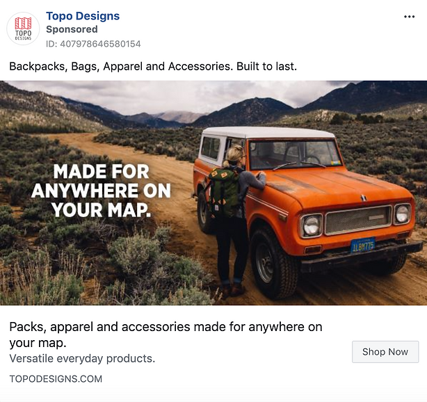 A person with a backpack stands next to an orange SUV on a dirt road with mountains in the background. Text reads: "MADE FOR ANYWHERE ON YOUR MAP.