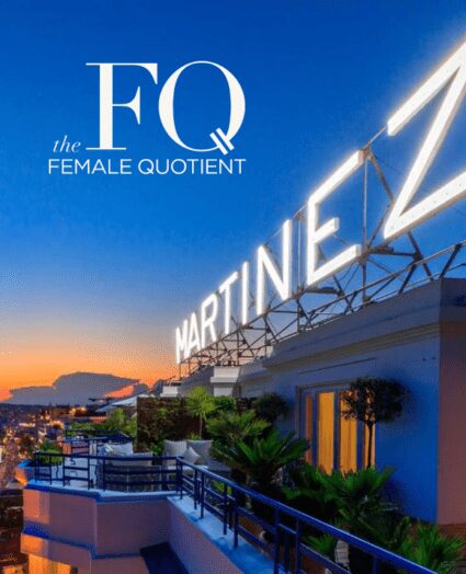 A rooftop view of the Hotel Martinez at sunset, featuring the illuminated "MARTINEZ" sign and the Female Quotient logo in the sky.