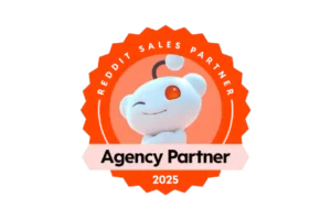 An orange badge with Reddit's mascot and the text "Reddit Sales Partner, Agency Partner, 2025.