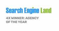 Search Engine Land logo with text stating "4X Winner: Agency of the Year" in gray font on a white background.